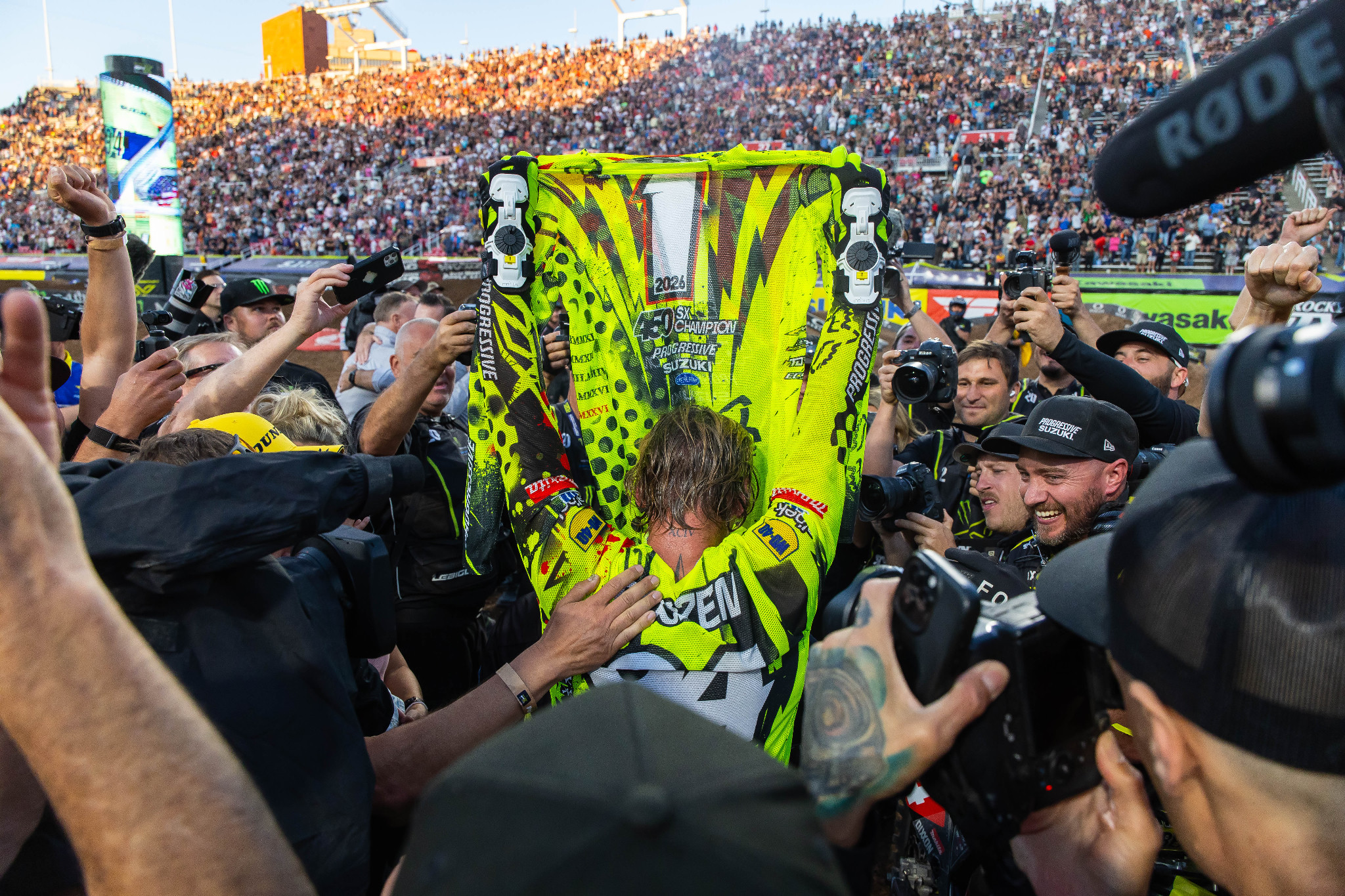 Ken Roczen raises his championship jersey amid the celebration in Salt Lake City